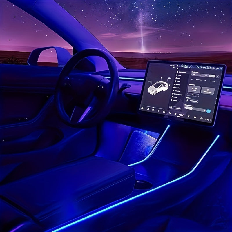 Tesla Model 3 interior with ambient blue LED lighting and touchscreen dashboard at night