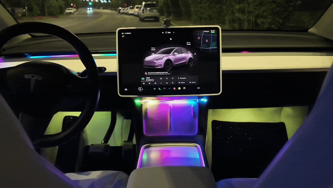 Tesla Model 3 interior featuring LightingBugTech Tesla Model 3 Model Y ambient lighting kit with colorful LED lights