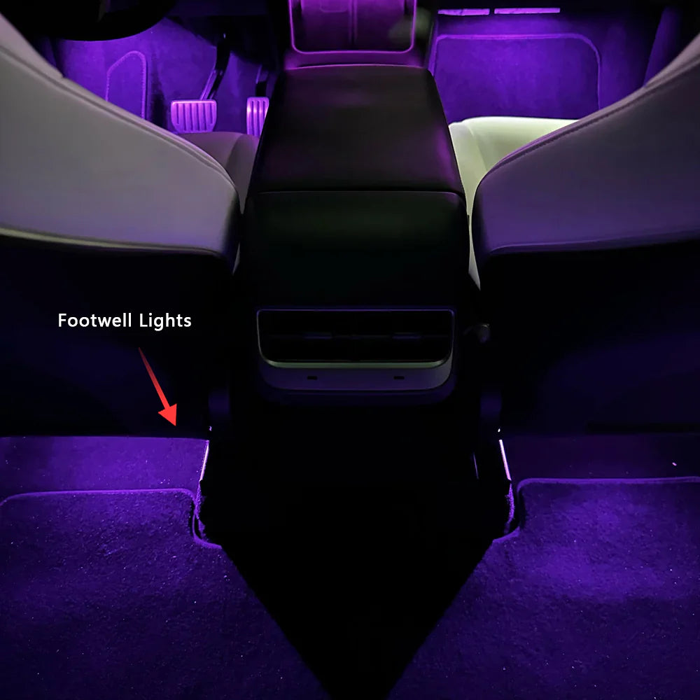 Tesla Model 3 Model Y ambient lighting kit showing purple footwell lights inside the car interior