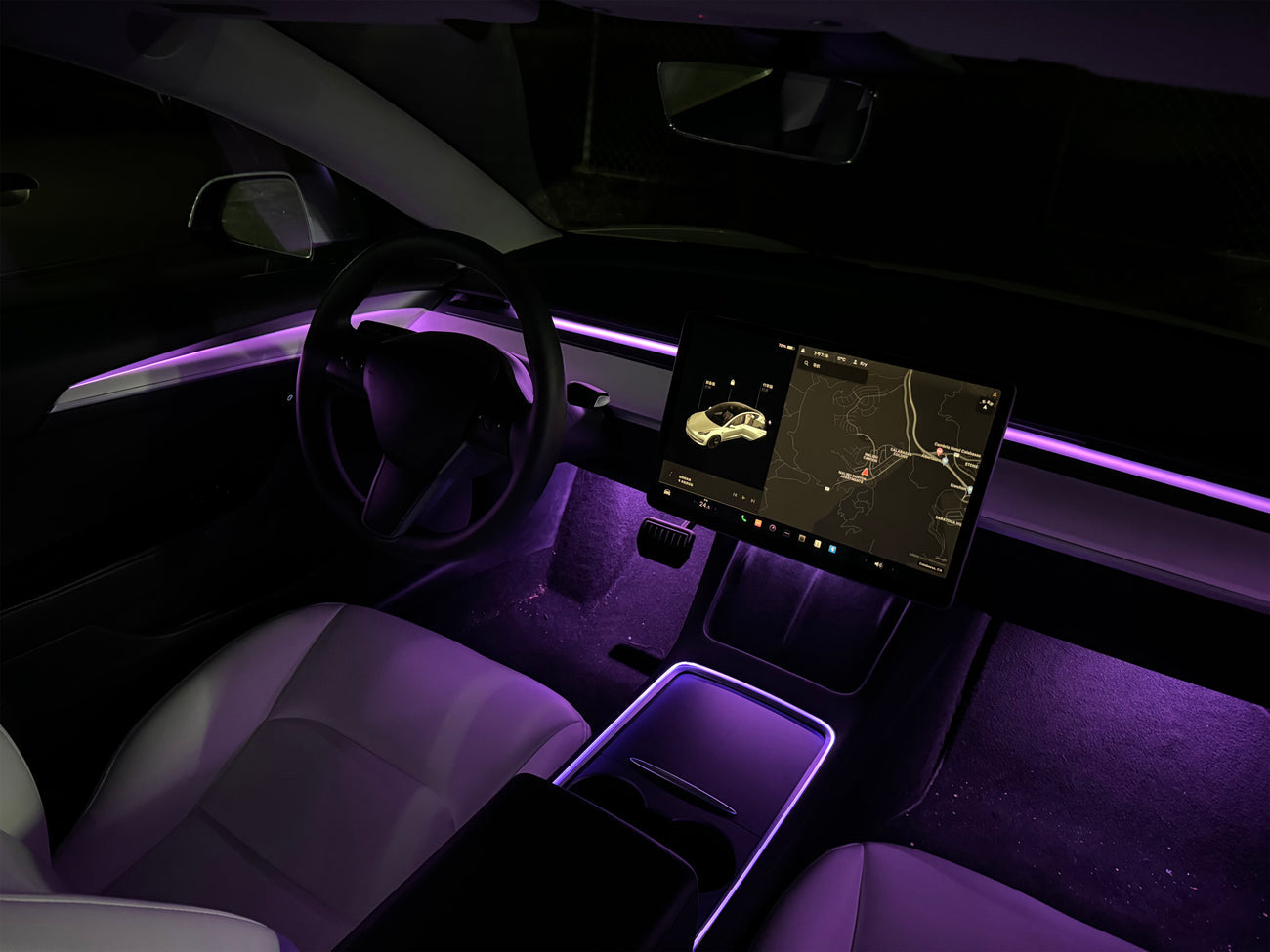 Tesla Model 3 interior with Lighting Bug Tesla Model 3 Model Y ambient lighting kit glowing purple