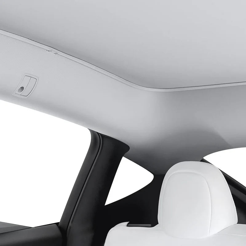 Interior view of Roof Glass Sunshade For Tesla Model 3/Y 2023-2021 that blocks sunlight and enhances comfort