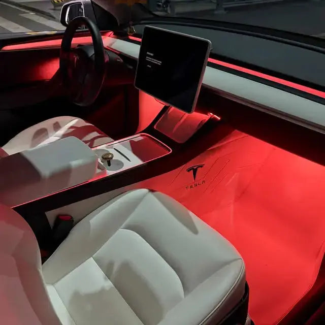 Tesla Ambient Lighting Kit installed in a luxurious Tesla car interior showcasing vibrant lighting effects