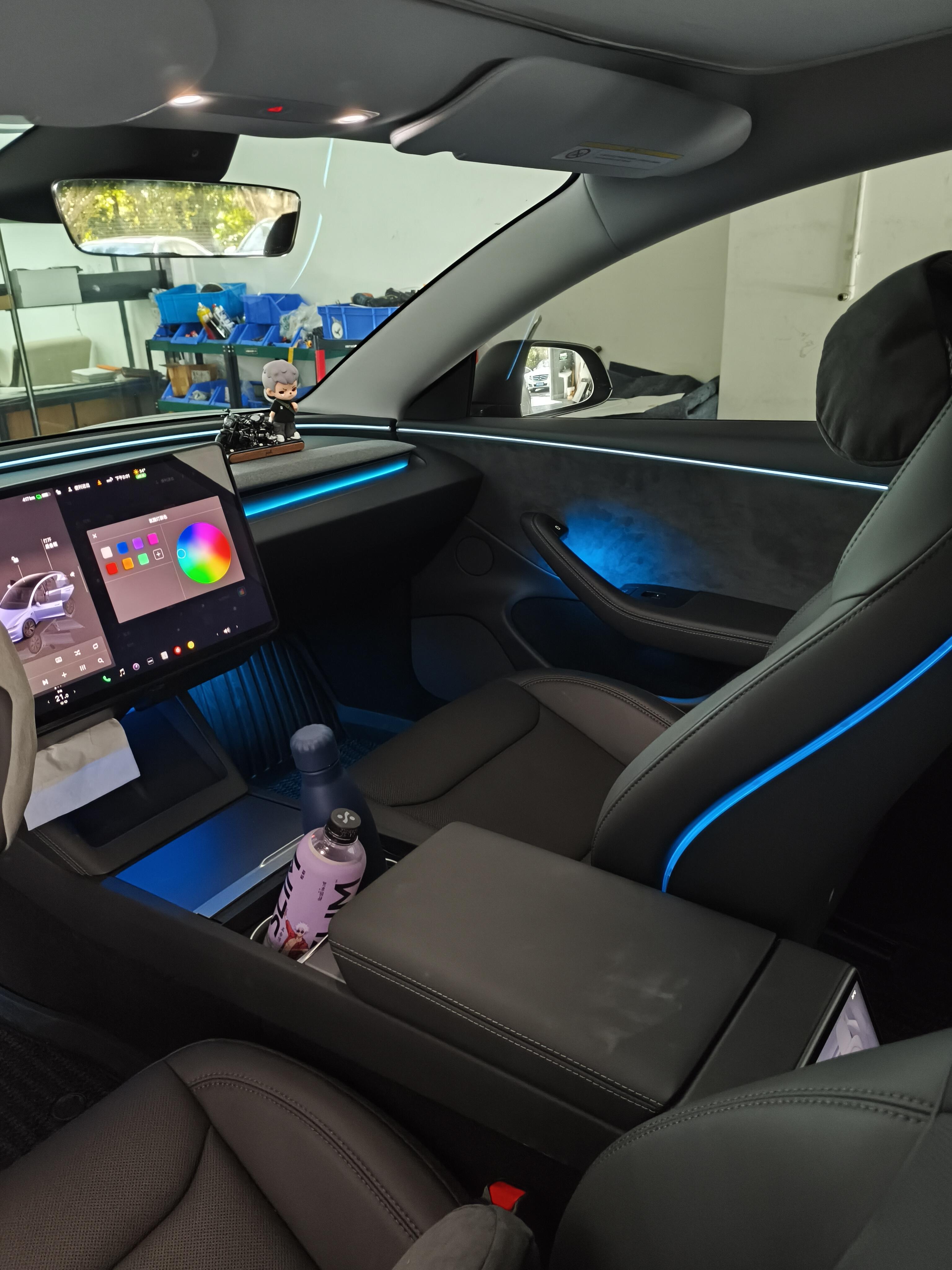 Tesla Highland & Juniper Ambient Lighting Kit installed in Tesla car interior with sleek design and vibrant colors