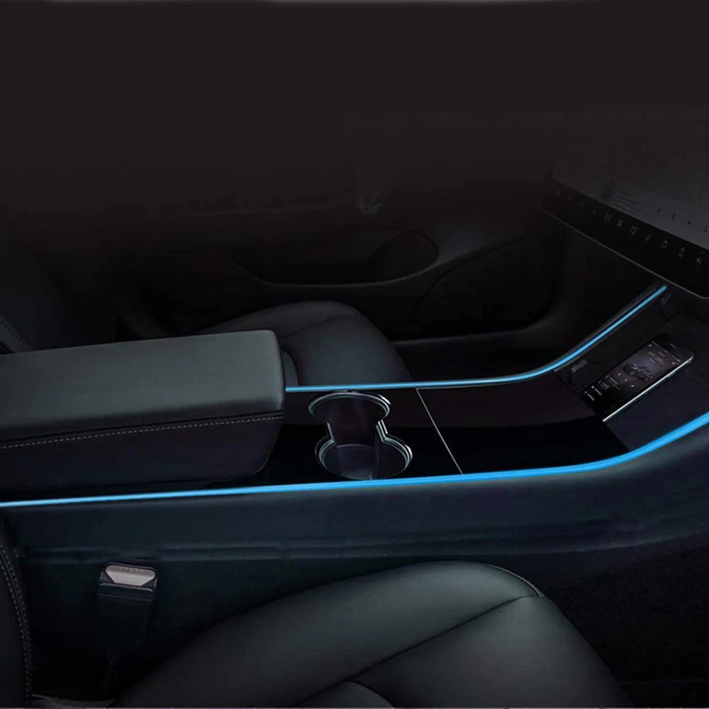 Tesla Model 3 Model Y Armrest Light ambient lighting by Lighting Bug glowing blue inside car interior